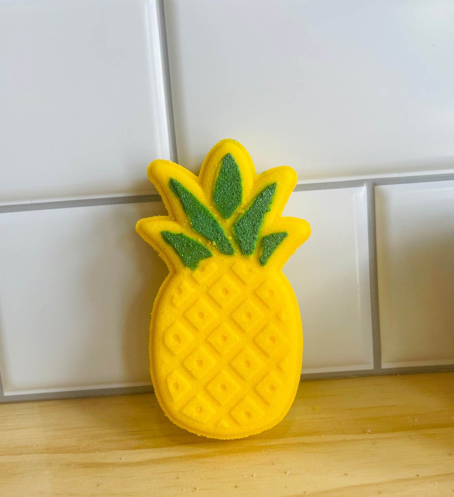 Bath Artisan hand-painting yellow pineapple bath bombs